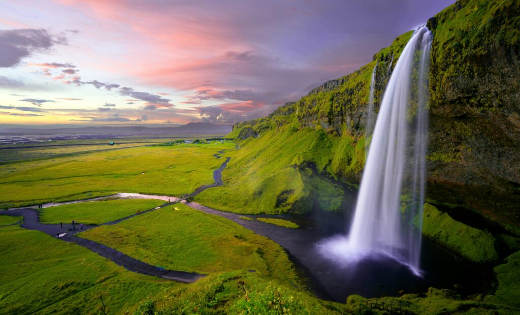 Iceland travel with waterfalls, mountains, and scenic natural landscapes